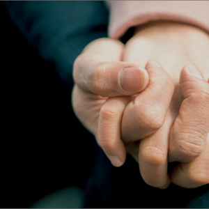 hands holding support