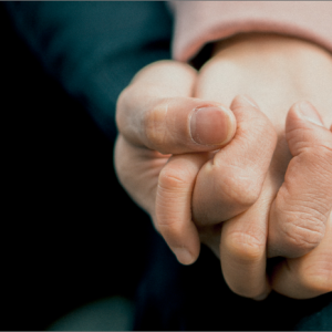 hands holding support